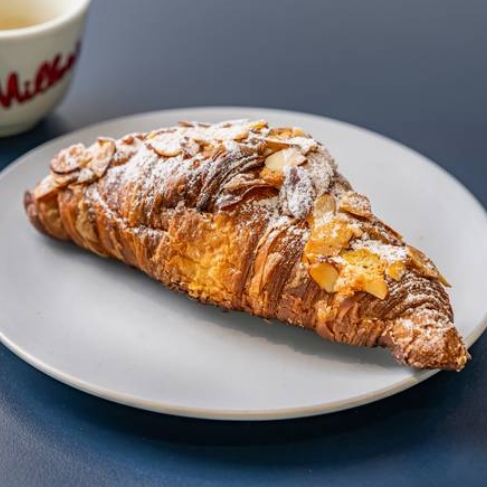 Almond croissant served at Nola Coffee